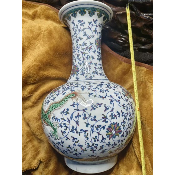 Pair of Qing‑Dynasty Vases with Relief Dragon‑Phoenix Patterns