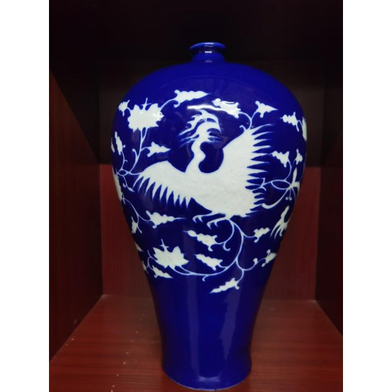 Ming‑Dynasty Gem‑Blue Glaze Meiping Vase with Reserved White Phoenix Pattern