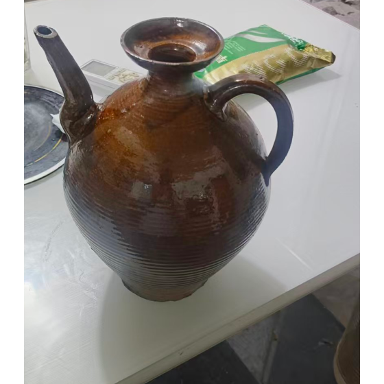 Brown Glaze String‑Pattern Ewer