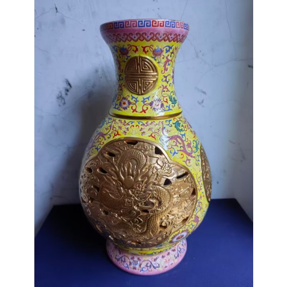 Yellow Ground Famille Rose Revolving Vase with Hollow-out Gilded Dragon and Fortune-Longevity Patterns