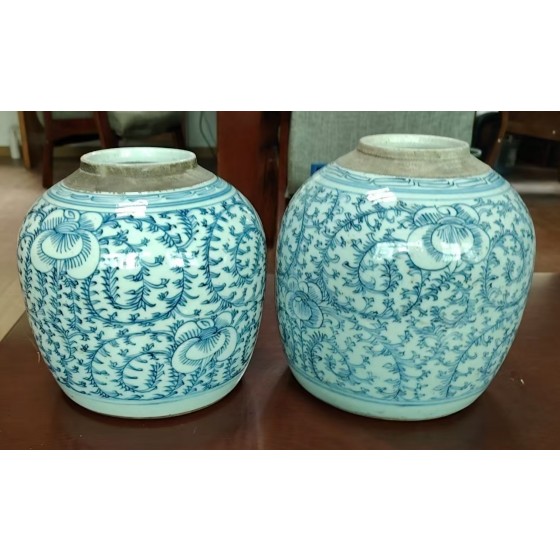 Pair of Light Blue and White Jars with Interlocking Floral Pattern