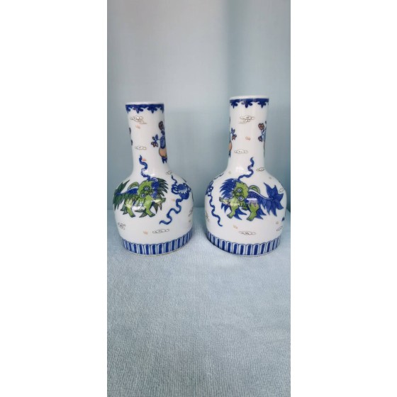 Pair of Blue and White Overglazed Bell-shaped Vases with Lion Playing Ball Motifs